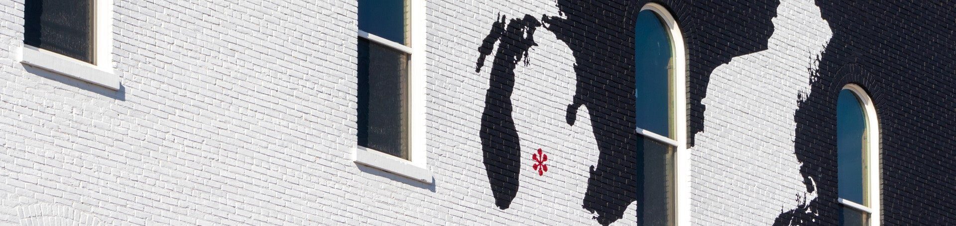 This is an image of a mural of the state of Michigan in Hastings